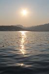 Sonnenaufgang, aufgenommen vom Boot aus mitten auf der Bucht von Agios Georgios (Korfu)
