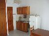 K�chenecke (Sp�le, Schr�nke, Geschirr, K�hlschrank und kleiner Herd