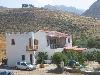 Ansicht der Taverne und Pension Anatoli bei Lentas